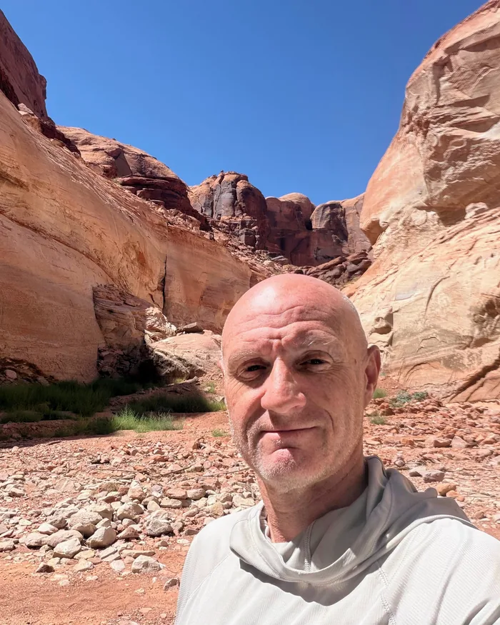 Daniel Simmons in a sandstone canyon in the American Southwest